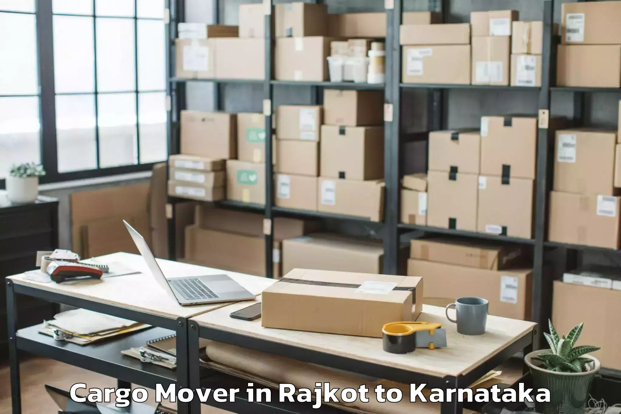 Reliable Rajkot to Savanur Cargo Mover